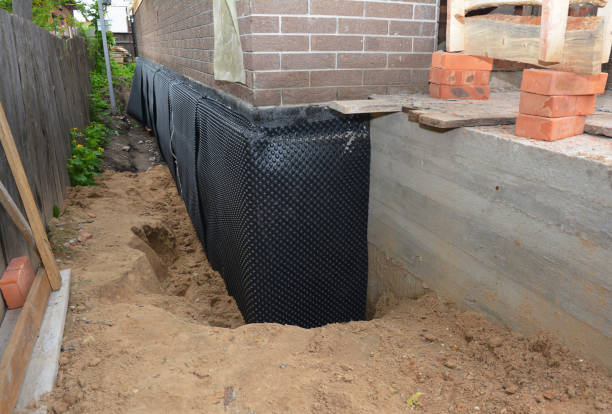 SJ Waterproofing Pros technician performing targeted Emergency Waterproofing assessment in Rose, NY